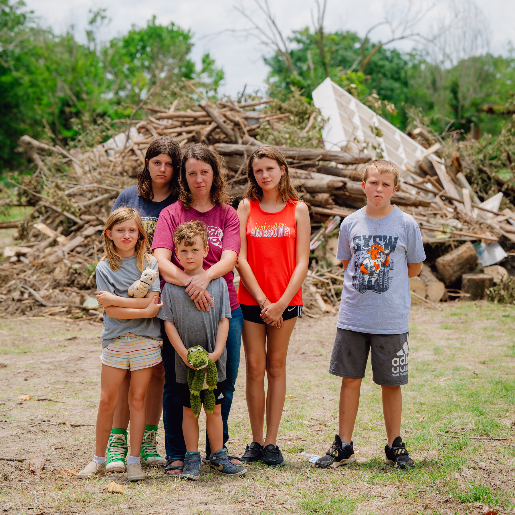 A Mother of Five Survived the Flood to Return to a Cabin in Ruins