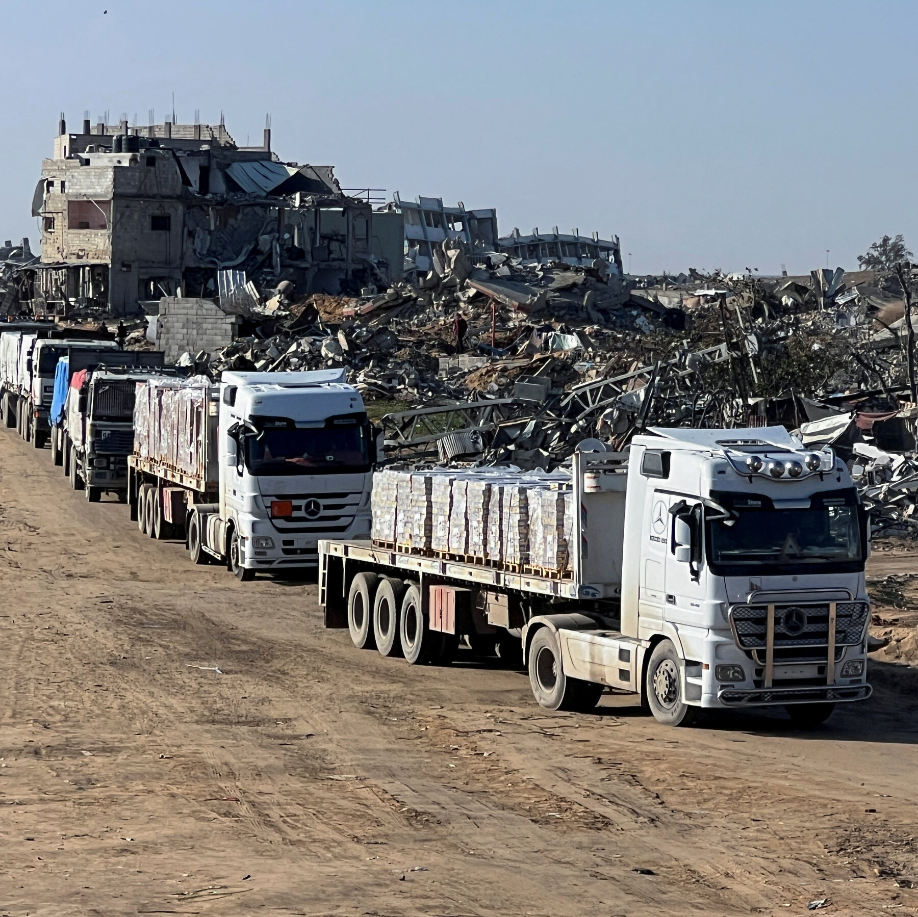 Aid agencies rush supplies into Gaza as fragile cease-fire holds for now.