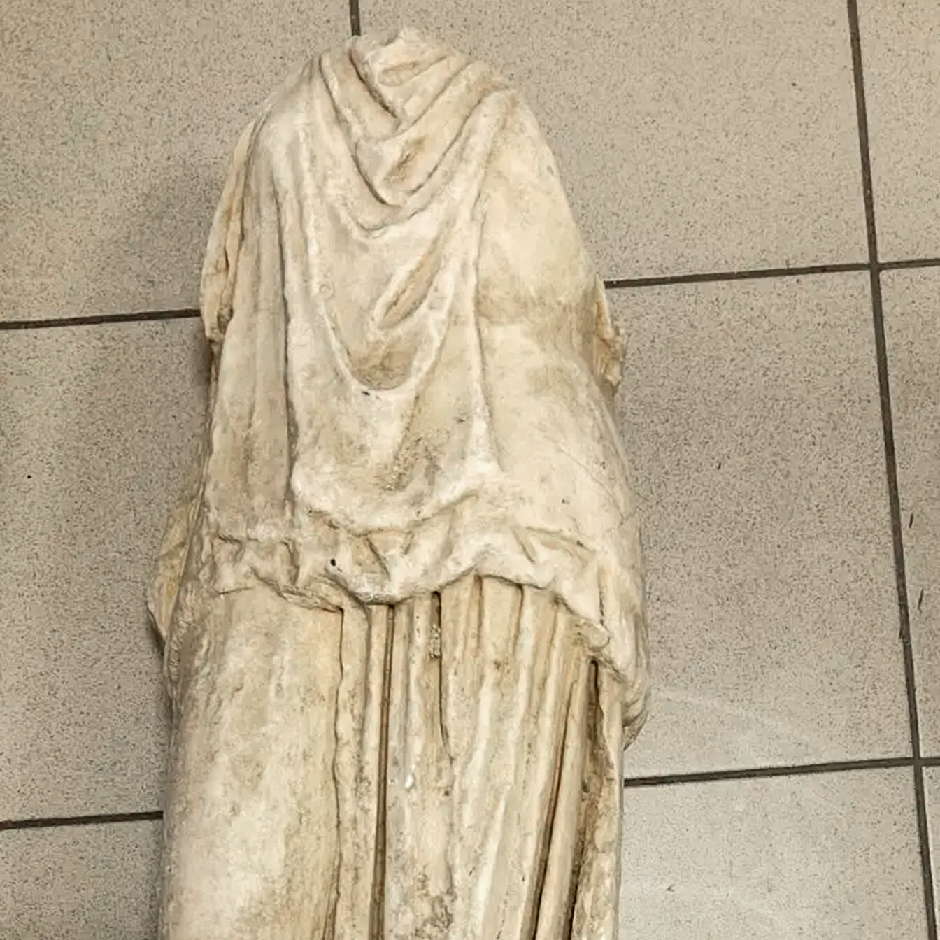 An Ancient Headless Statue Is Found Amid Trash in Greece