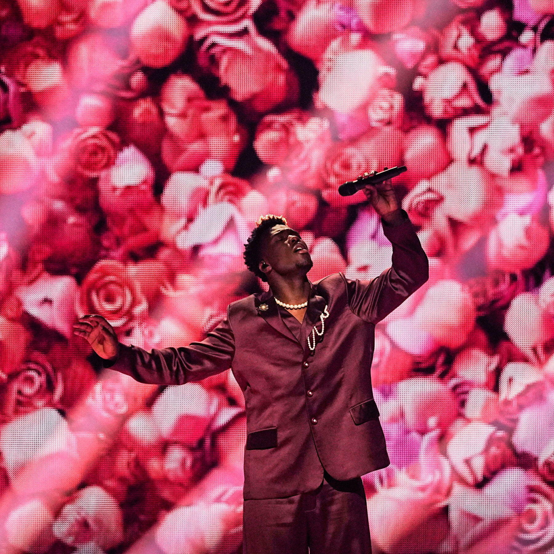 Claude, representing the Netherlands, is a refugee turned pop star.