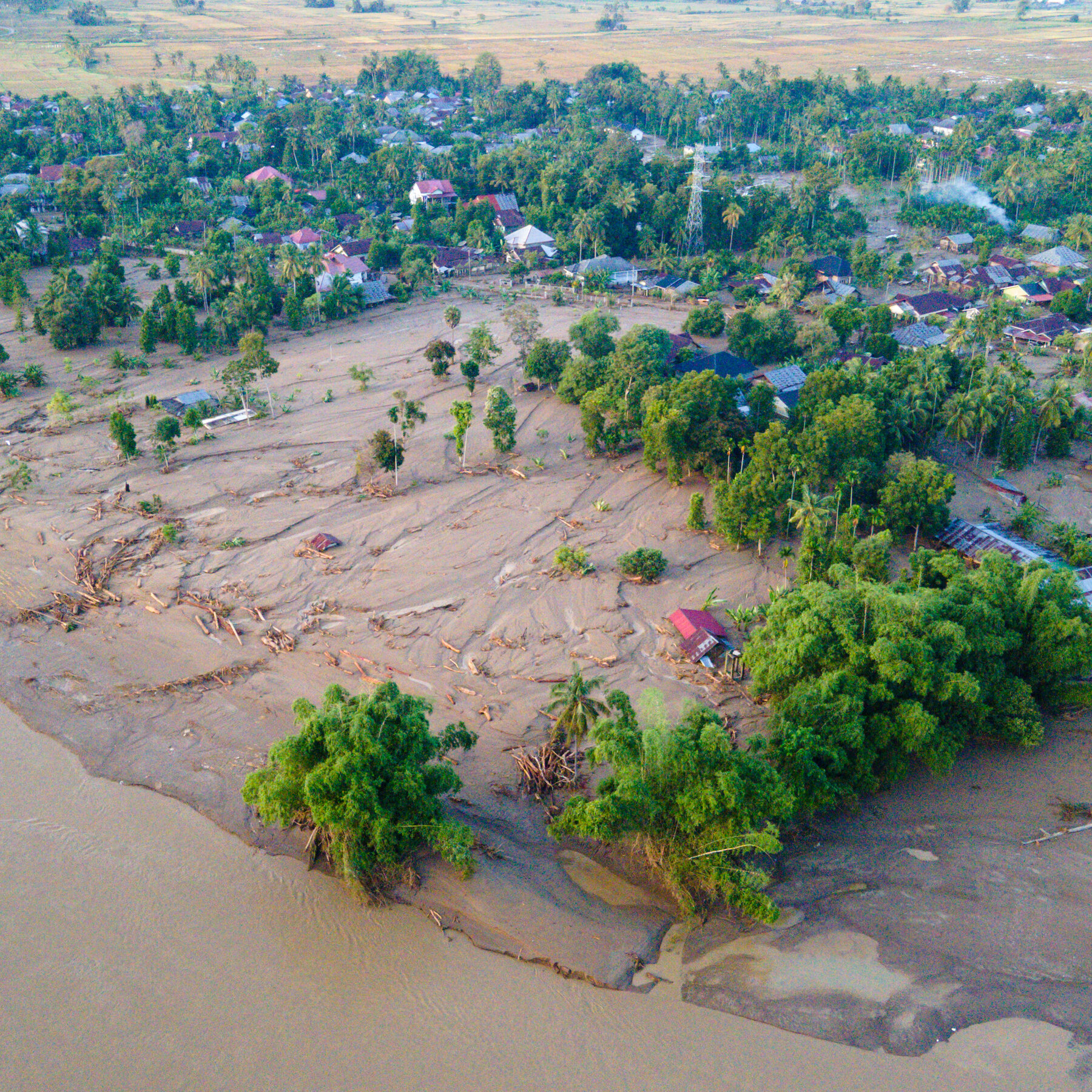 Deadly Floods in Indonesia Leave Hundreds Missing