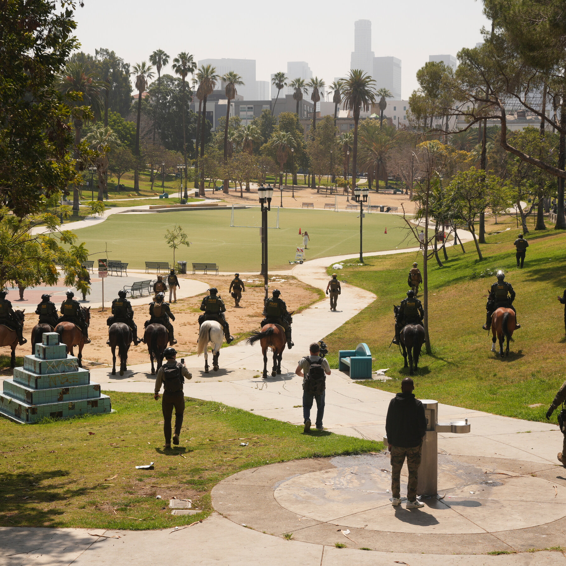 Federal Agents March Through L.A. Park, Spurring Local Outrage
