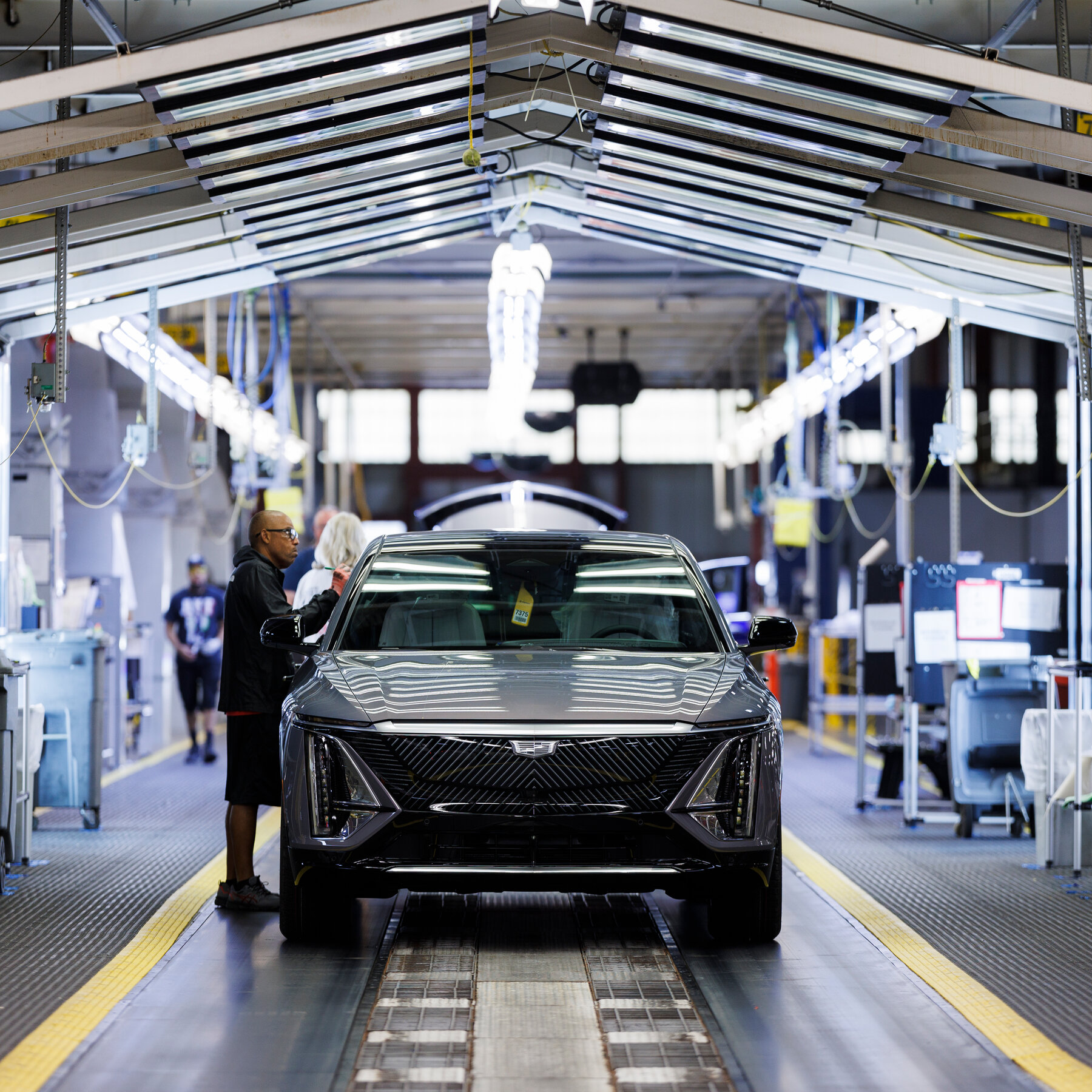 G.M. Profit Shrinks on Billion-Dollar Tariff Hit