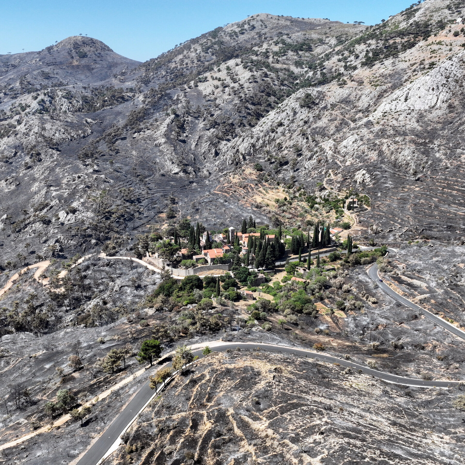 Housekeeper Arrested Over Wildfire That Scorched Greek Island