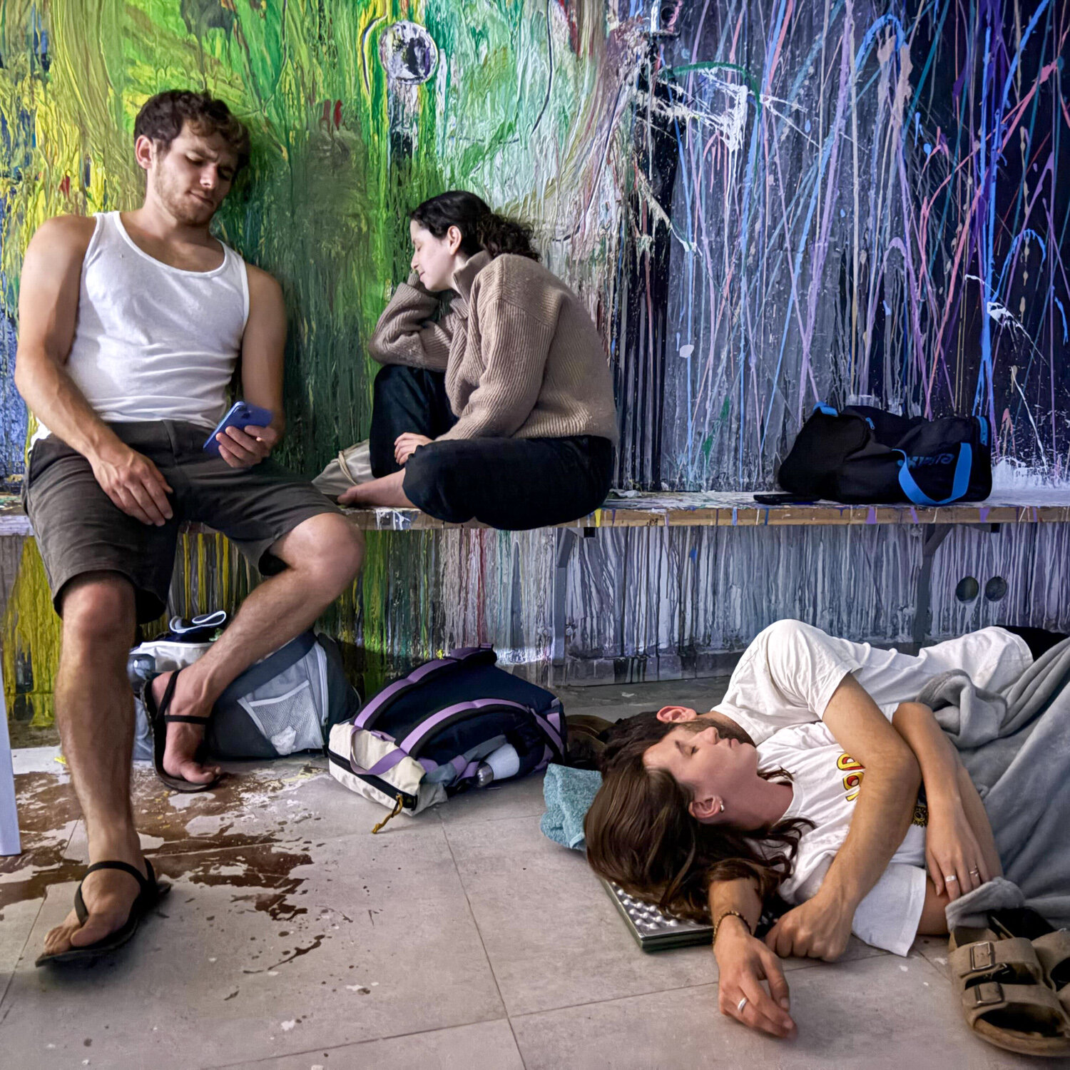 In one underground bomb shelter, Israelis huddle, and wait.