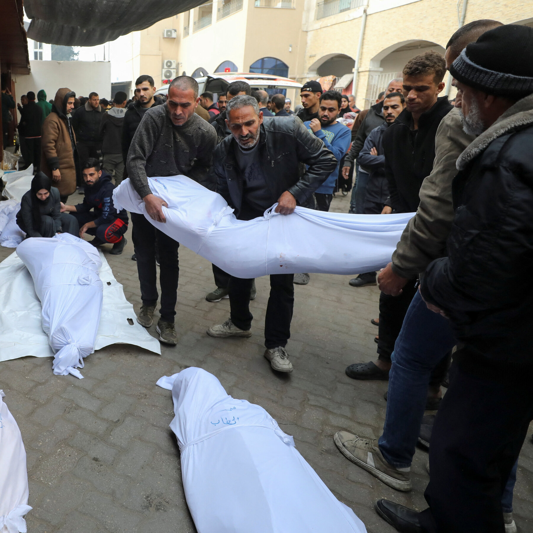 Israeli Strikes Kill Dozens of Gazans After Cease-Fire Deal Is Announced, Emergency Officials Say