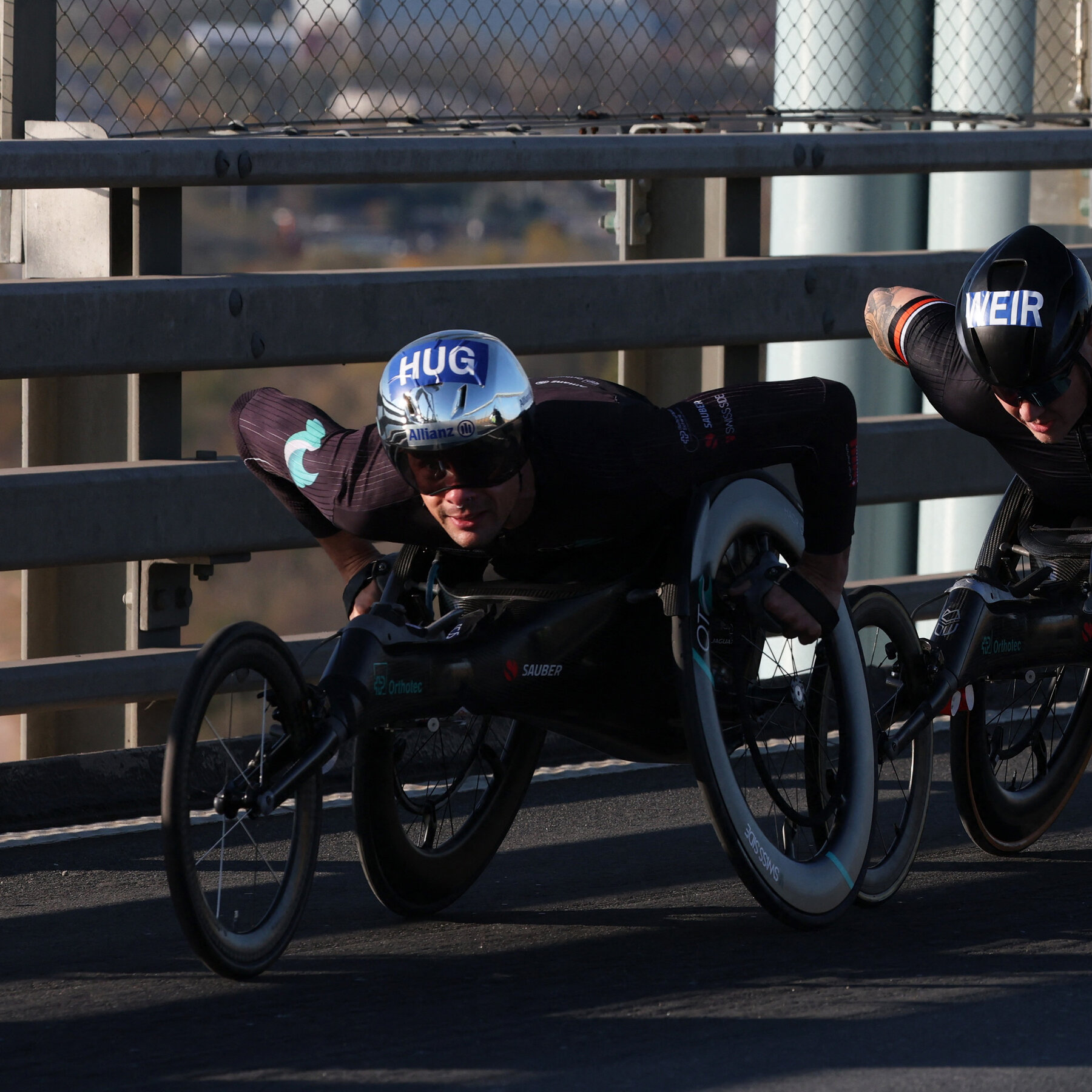 Marcel Hug wins a record 7th New York City Marathon men’s wheelchair race.