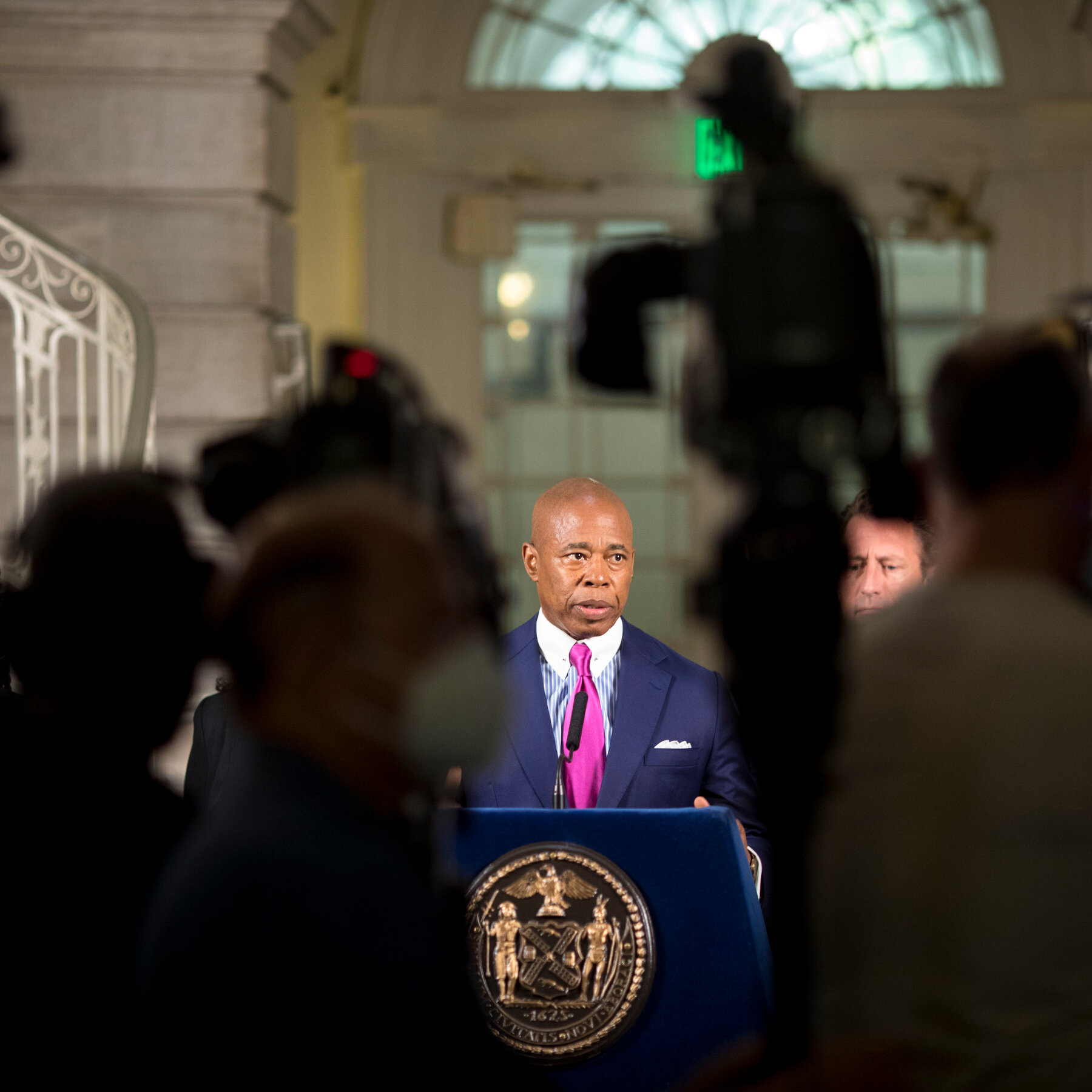 Mayor Adams’s Stance on Migrants Has Evolved, in Trump’s Direction