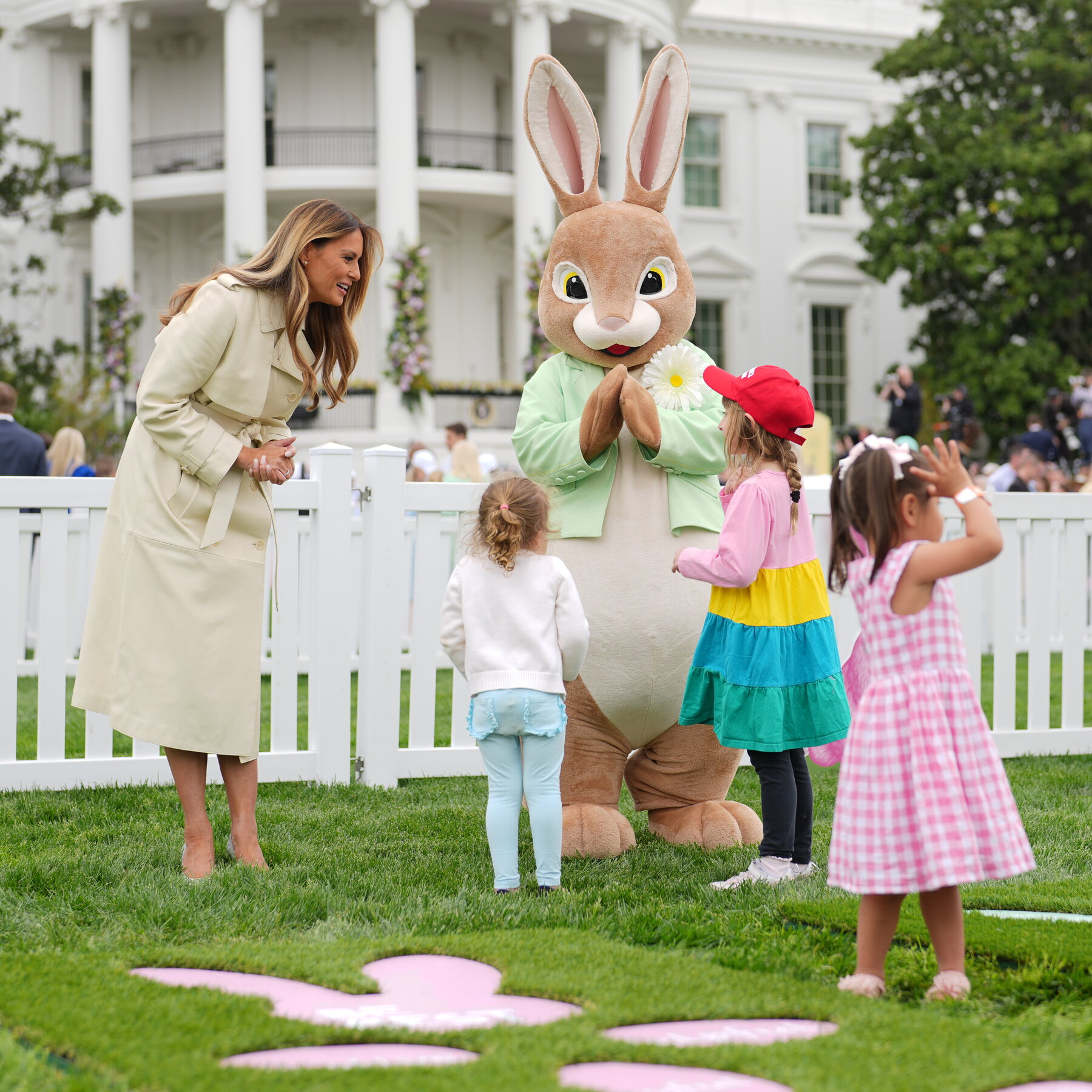 Melania Trump Opts for Trench Coat at White House Easter Egg Roll