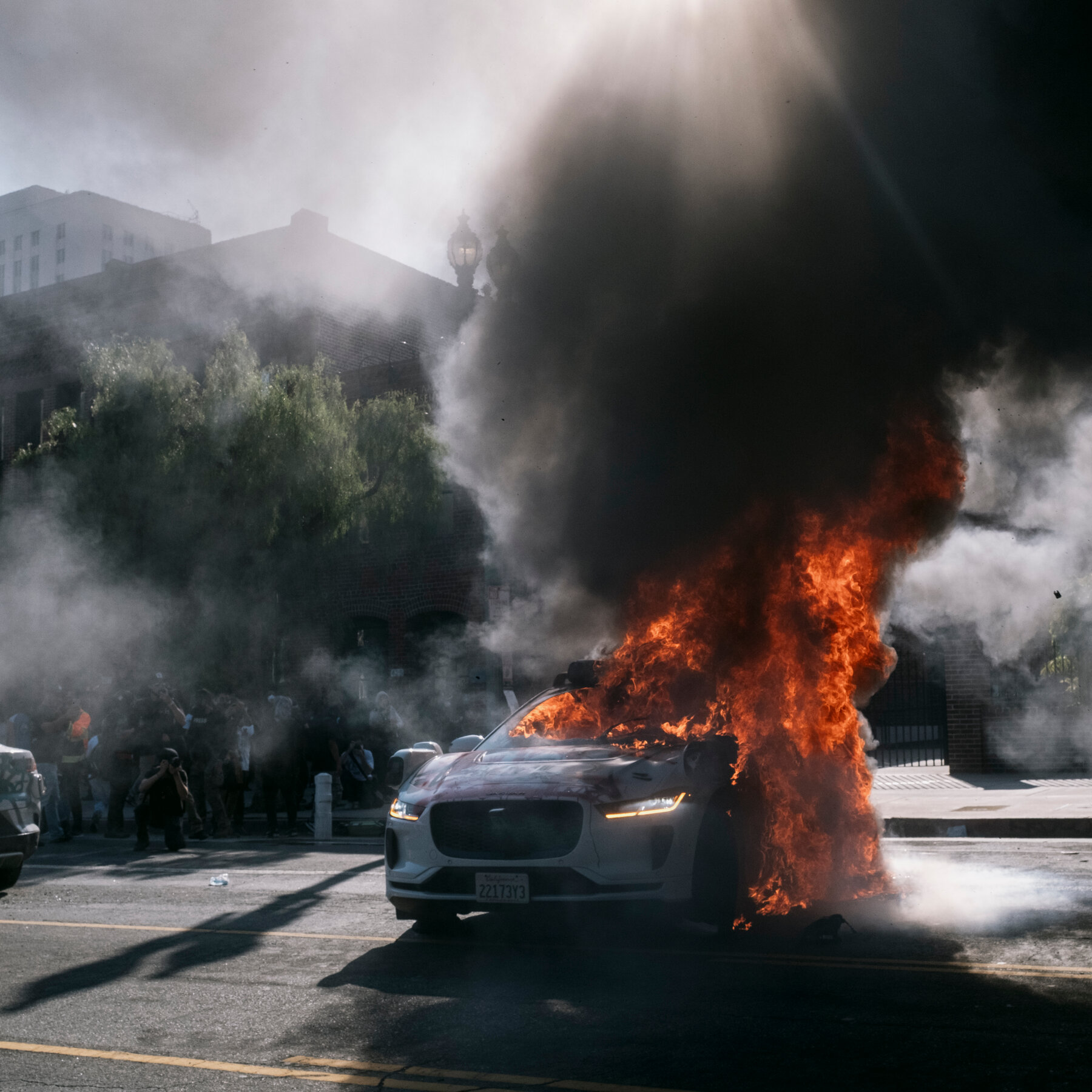 Protesters in L.A. Set Several Waymo Cars on Fire Amid Police Clash