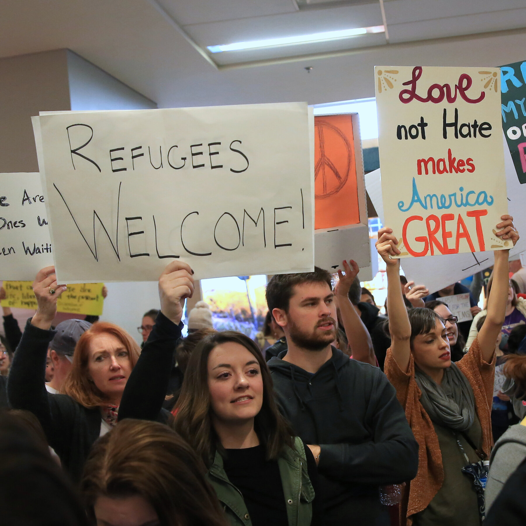 Rights groups, but few world leaders, race to condemn the travel ban.