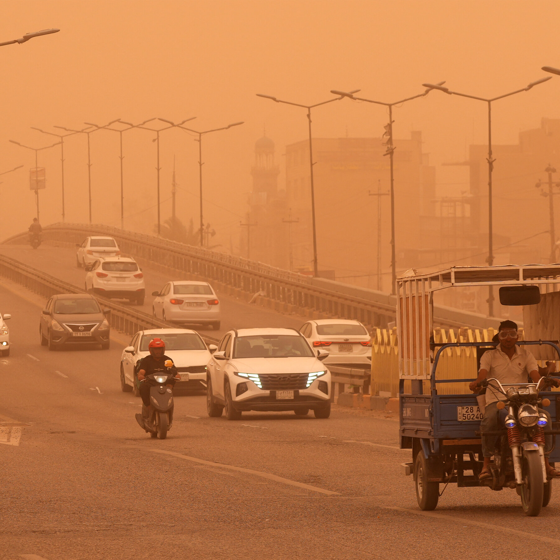 Sandstorm Turns Iraq’s Skies Orange and Sends Thousands to Hospitals