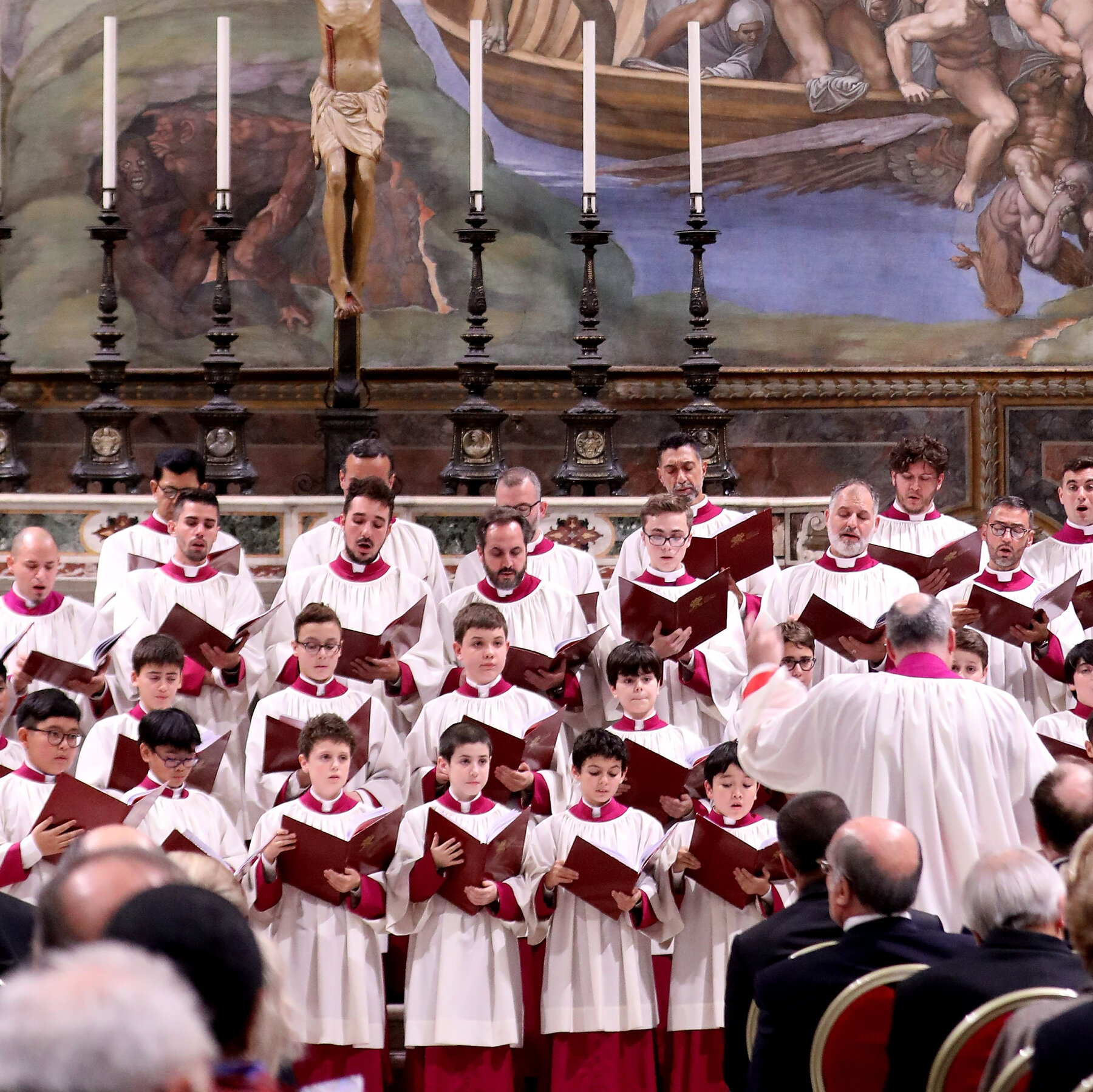 The funeral music is largely being sung in Gregorian chant.