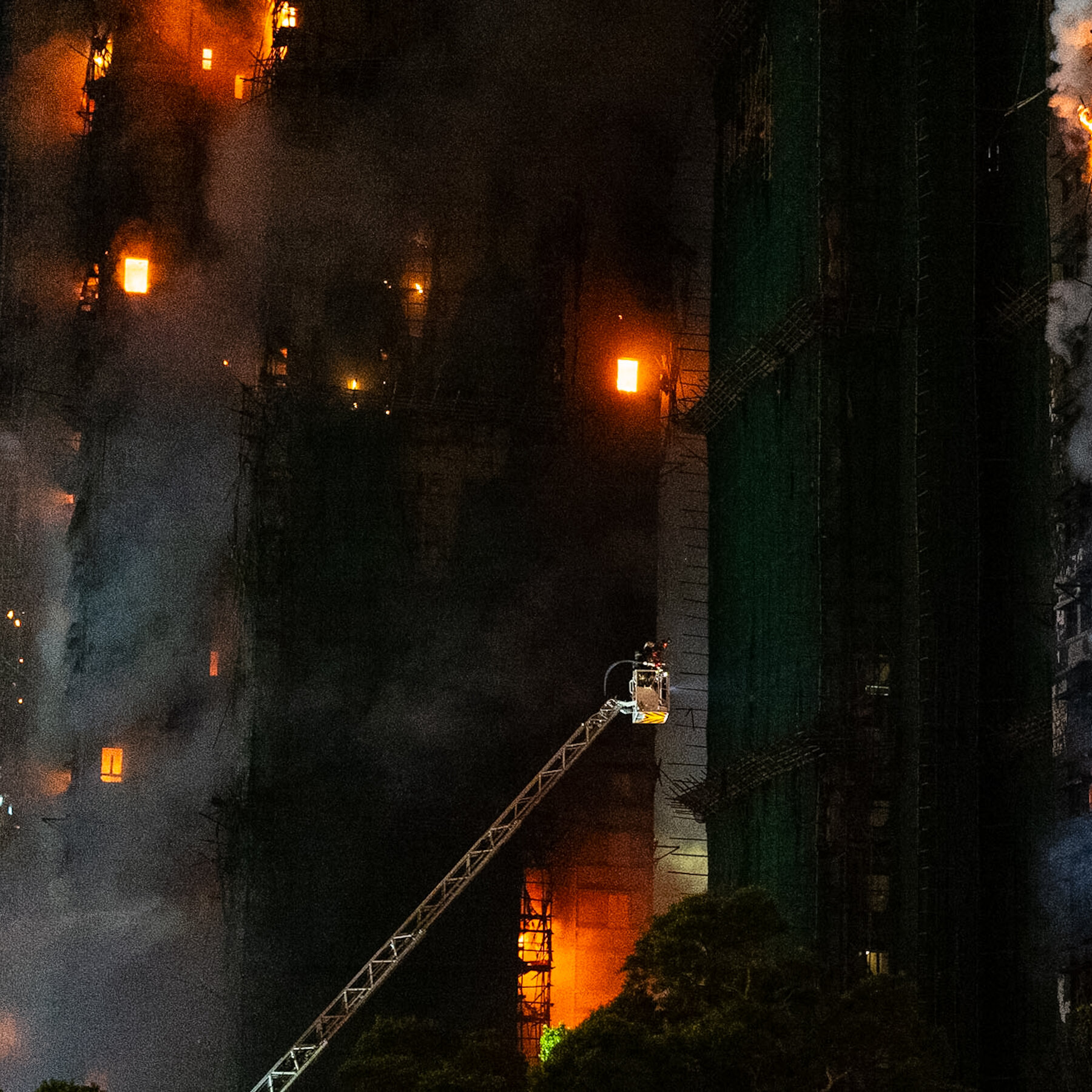 Three people tied to a construction company were arrested on suspicion of manslaughter.