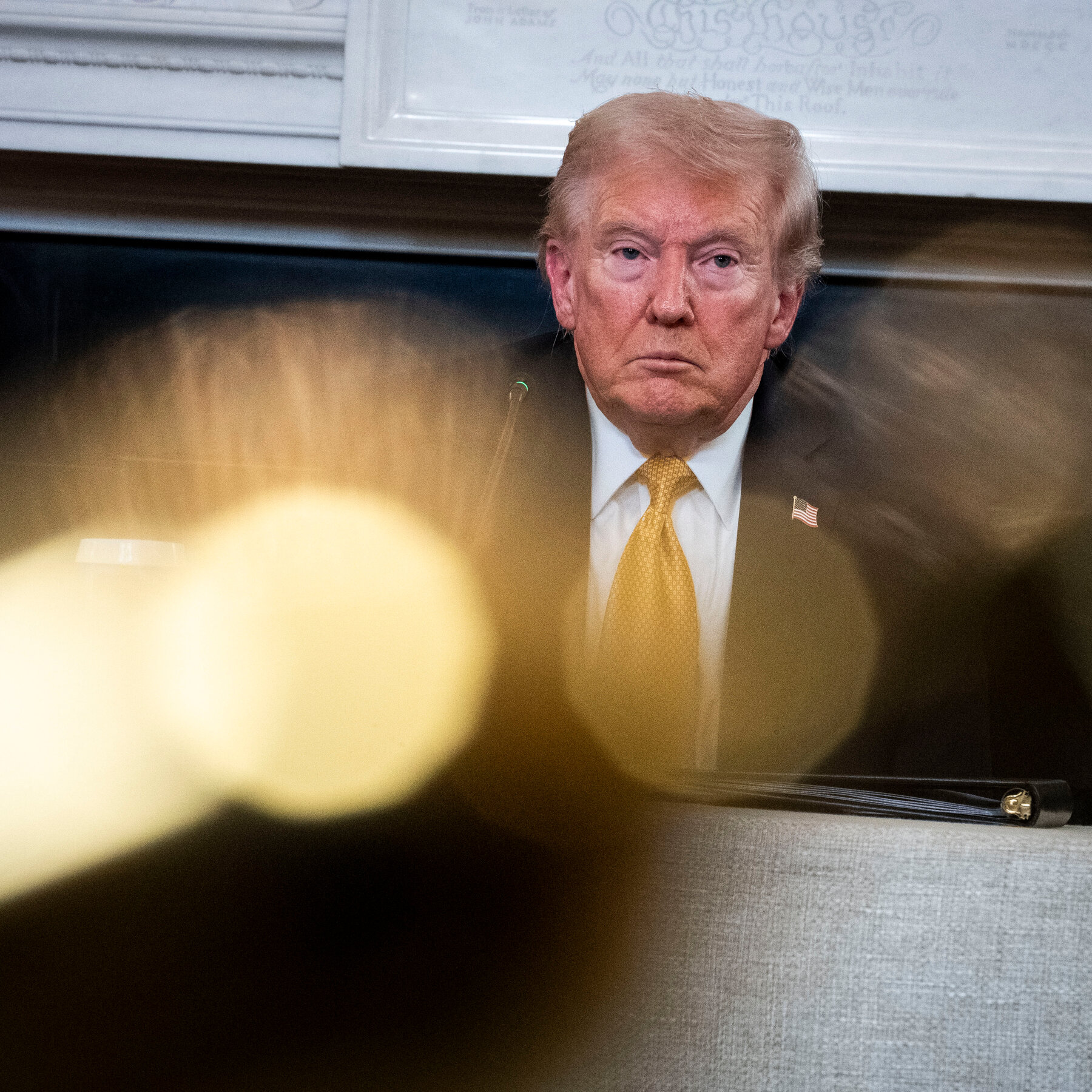 Trump Leaves Behind a Reeling Washington to Chase a Deal With China