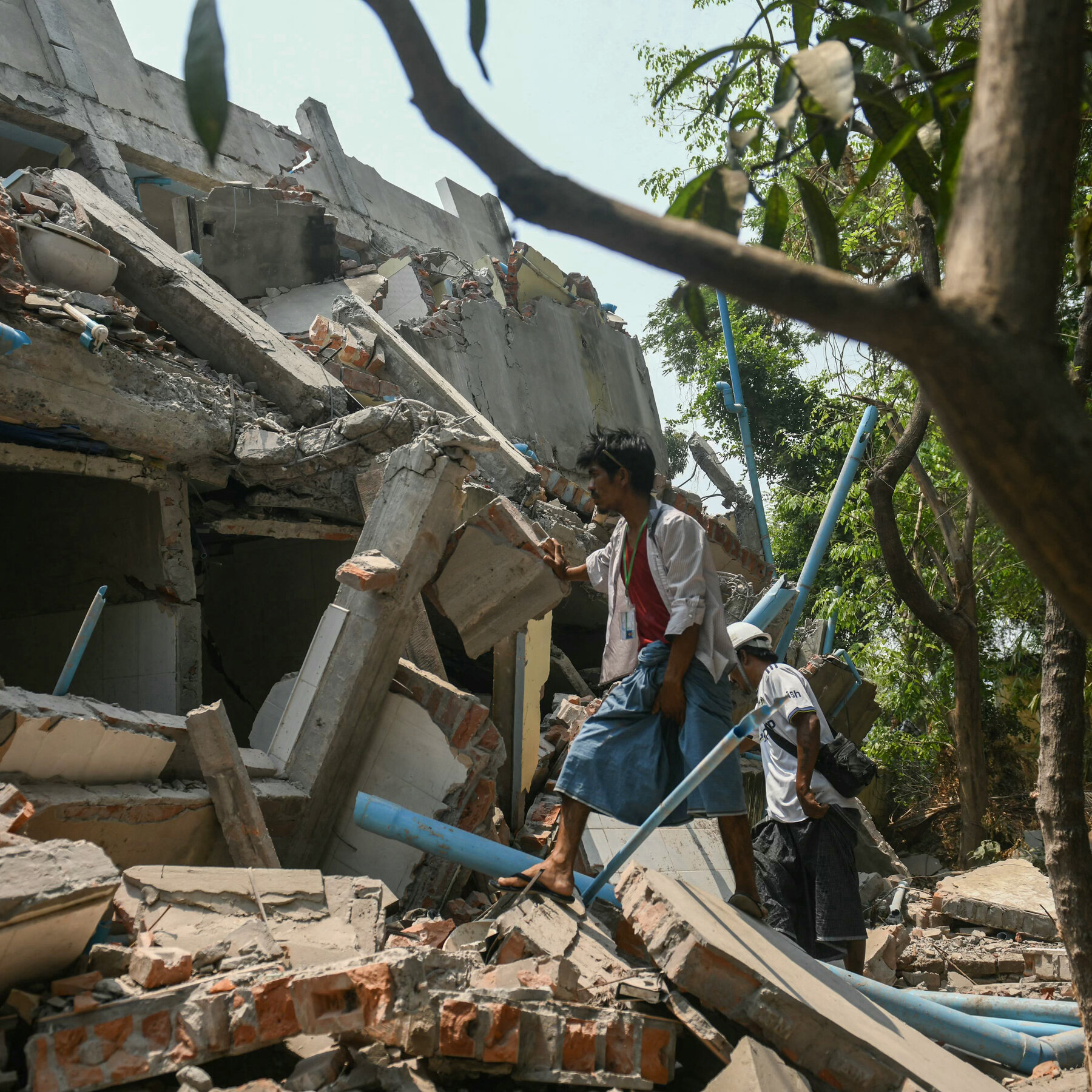 Volunteer Rescuers in Mandalay Sift Through Earthquake Rubble