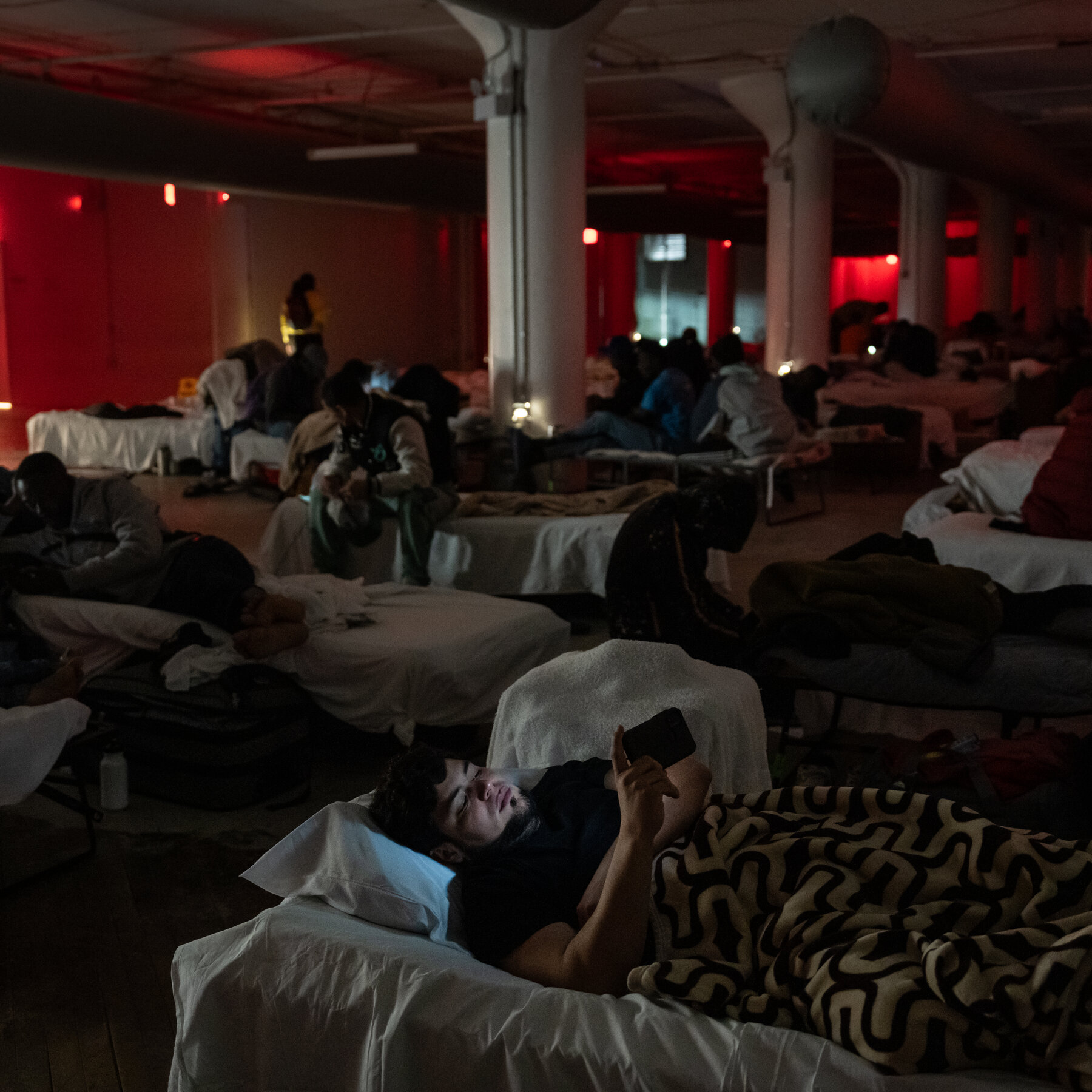 What a Photographer Saw in New York’s Migrant Shelters