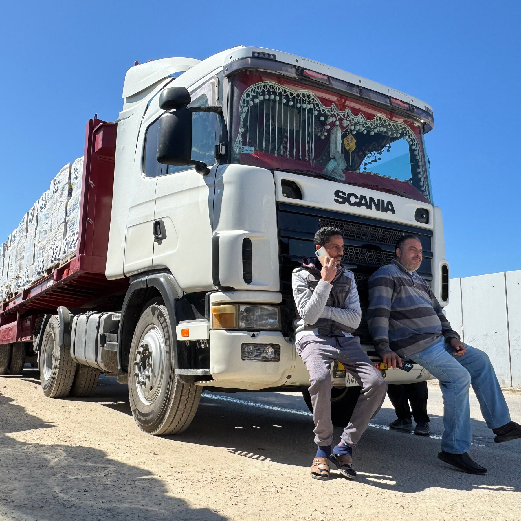 What to Know About Israel’s Decision to Halt Aid to Gaza