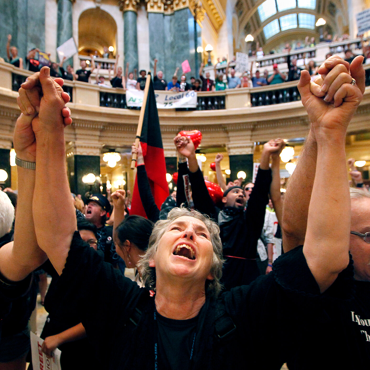 Wisconsin Judge Strikes Down Limits on Public Sector Unions
